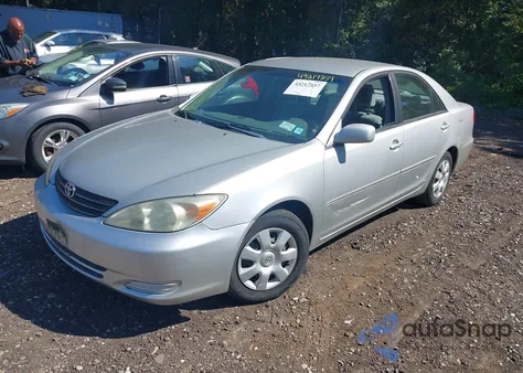 2003 Toyota Camry Le z USA, uszkodzony, nr VIN 4T1BE32K13U123714